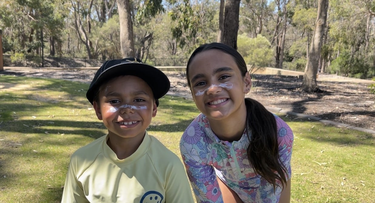 Kids with sun cream